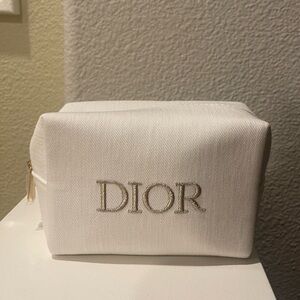 Dior cream linen pouch